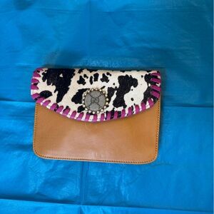 Tan Leather Shoulder Bag with Black-and-White Cowhide Flap and Pink Trim